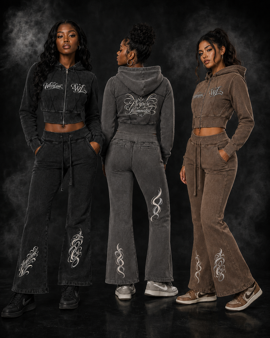 Three women wearing WHYELUME Purpose Illuminated vintage washed cropped hoodies and matching flared pants
