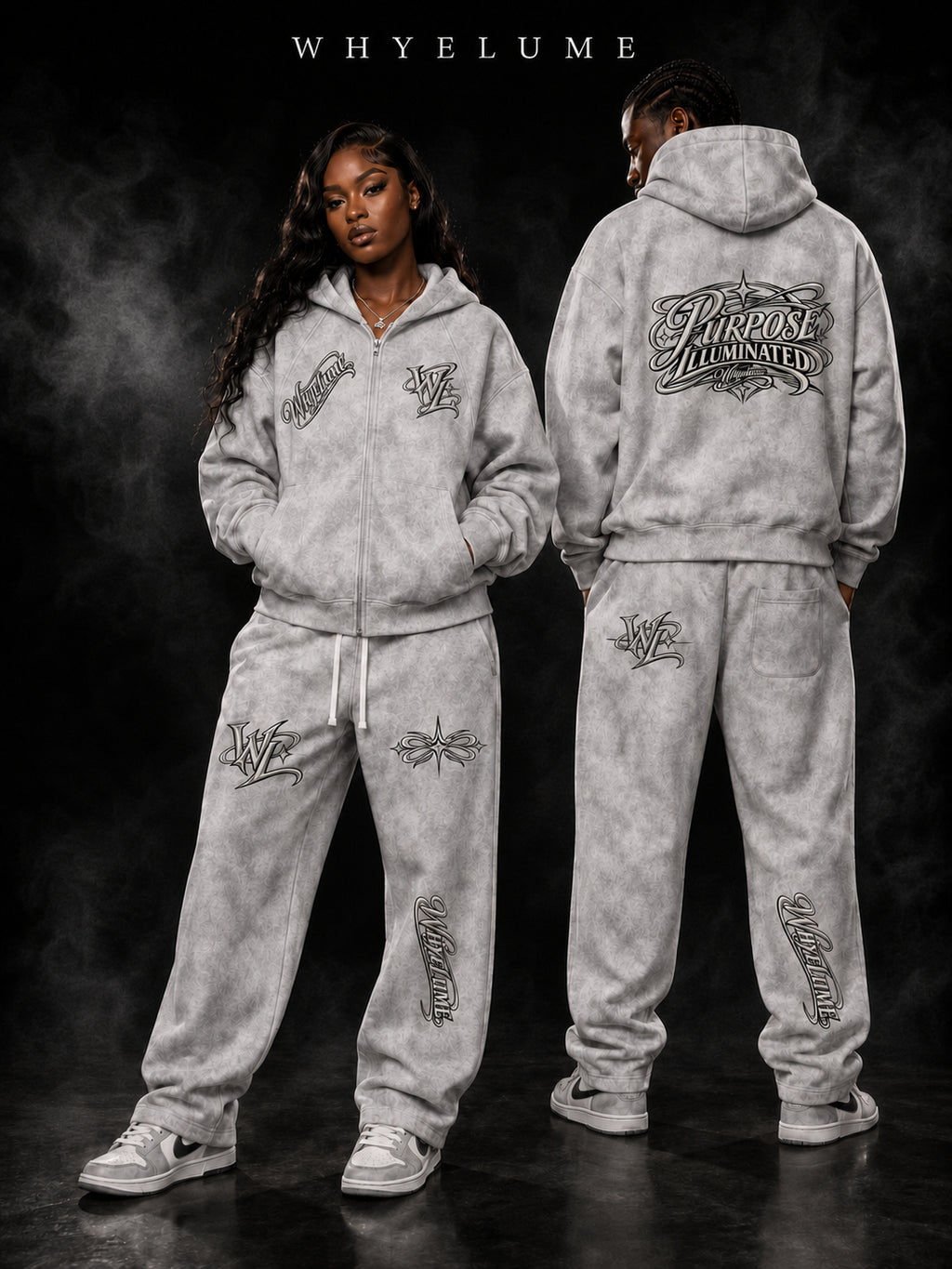 Man and woman wearing flower gray WHYELUME Purpose Illuminated dirty washed hoodies and matching sweatpants
