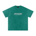 Front view of dark green snow washed WHYELUME Essentials Radiant Mark tee with small white wordmark chest graphic