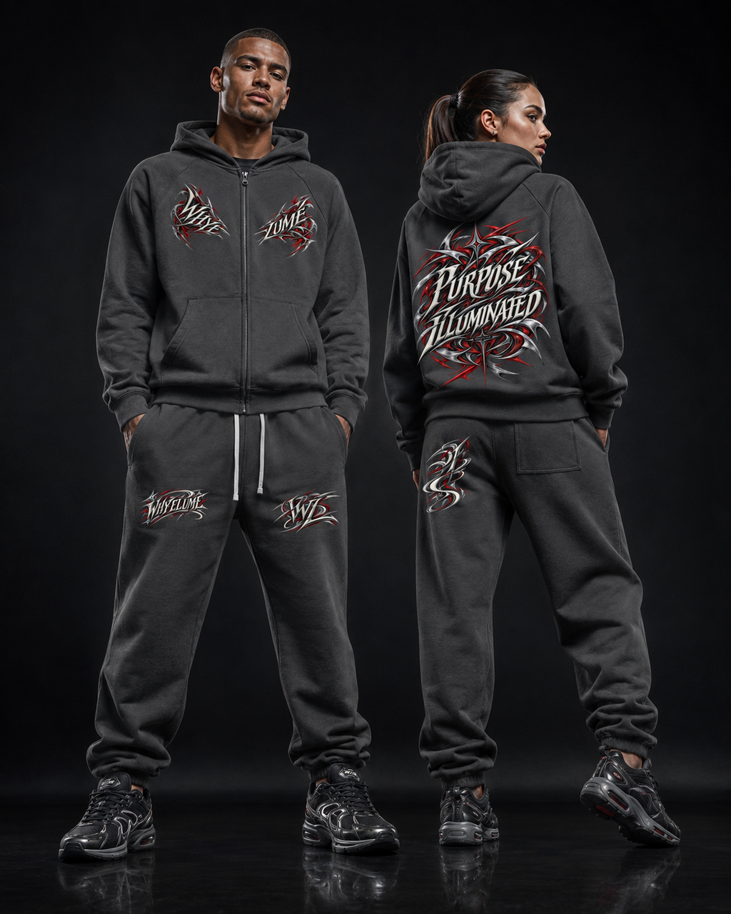 Man and woman wearing WHYELUME Purpose Illuminated essential full-zip hoodies and matching sweatpants
