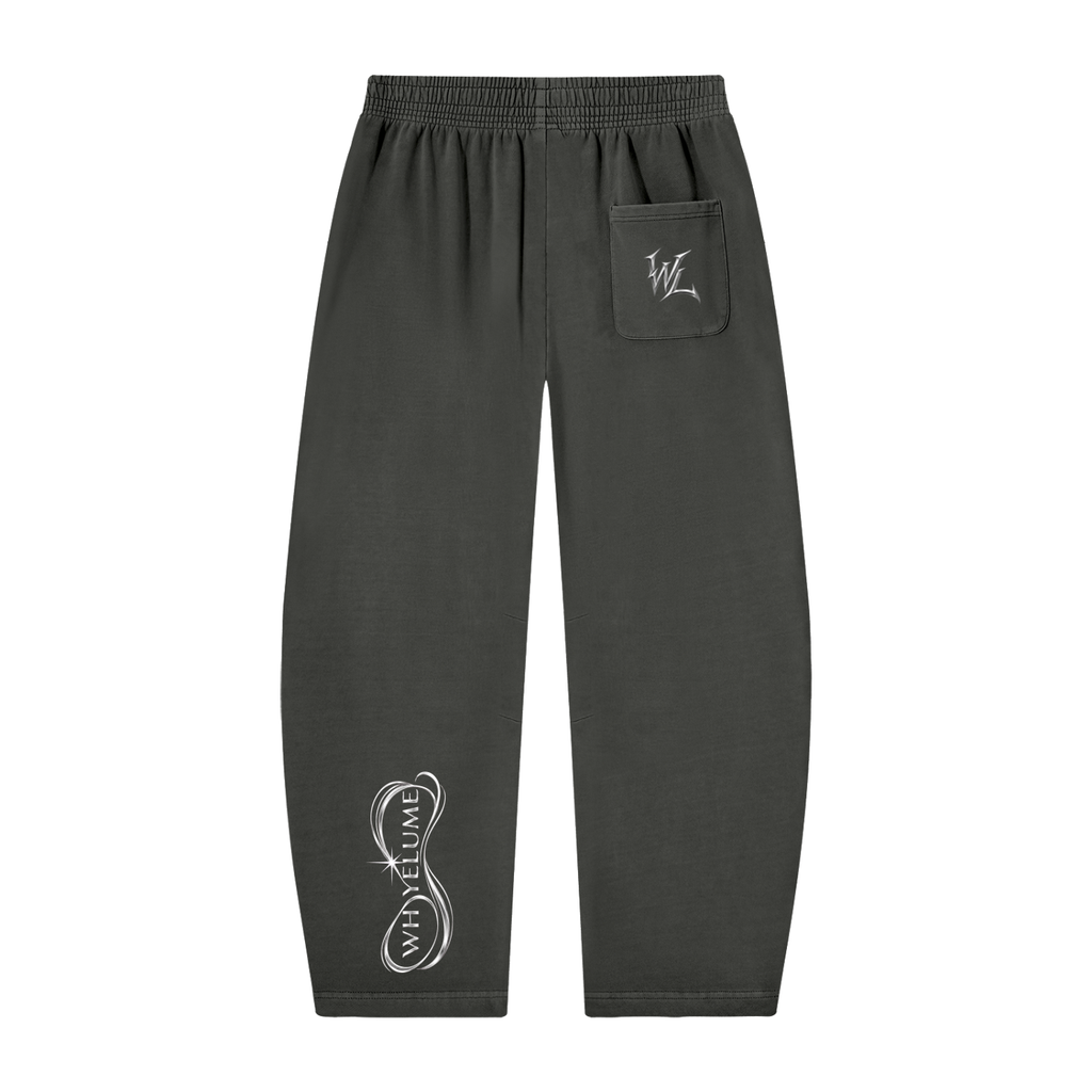 Back view of dark gray WHYELUME Purpose Illuminated barrel-leg sweatpants with white WL pocket mark and lower leg graphic