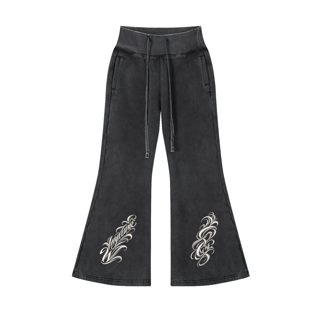 Front view of washed black WHYELUME Purpose Illuminated vintage washed flared fleece pants with white swirl graphics on both legs