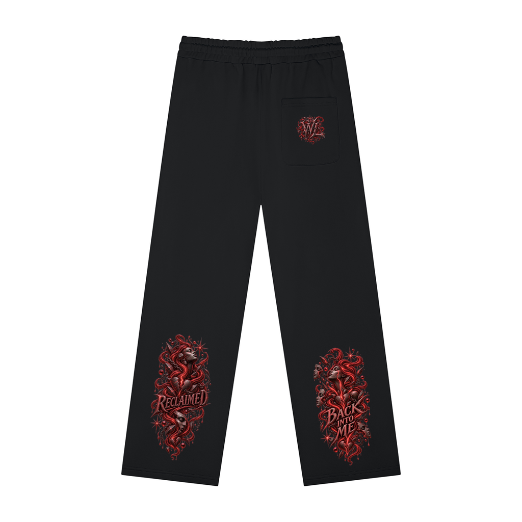 Back view of black WHYELUME Poured Empty sweatpants with red graphic panels on both legs and back pocket logo