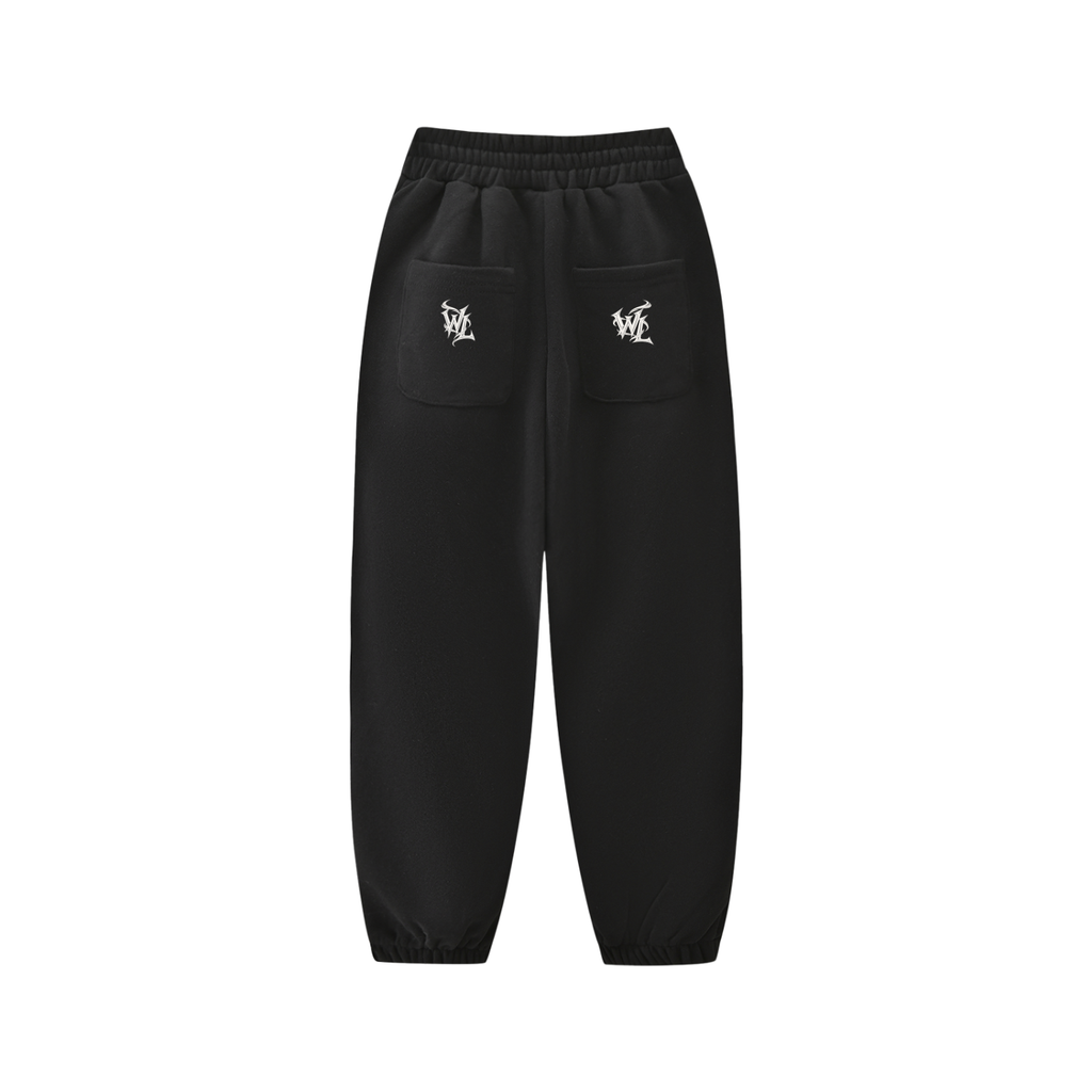 Back view of black WHYELUME Kids Split Mark fleece joggers with white WL monogram on back pockets